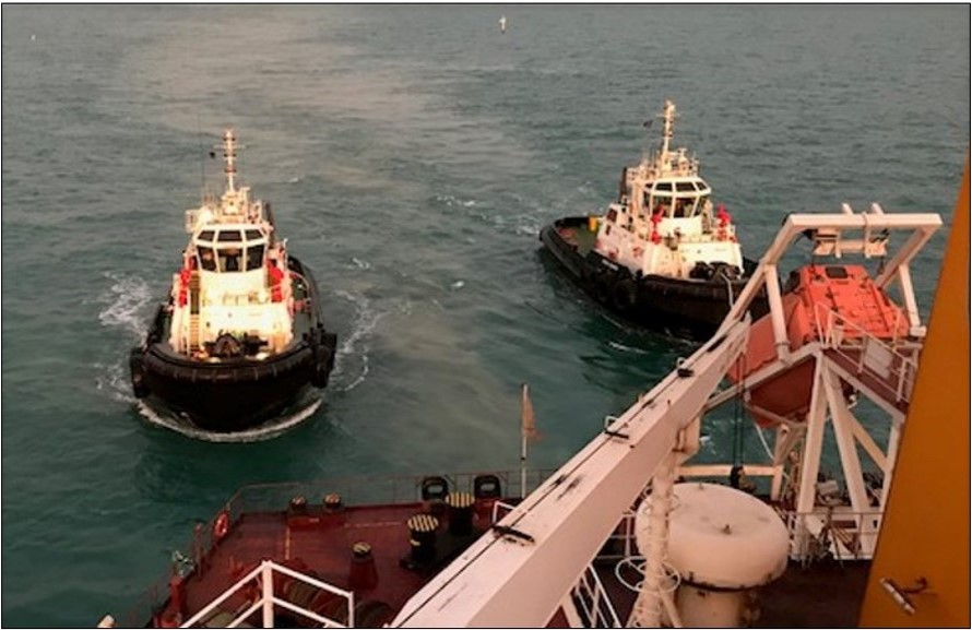 Figure 5: Tugs Harry Evans arriving at Orient Centaur and Peter Crooke fast on the port quarter. Source: Ports North pilots