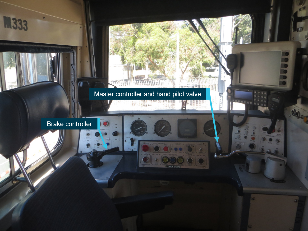 Figure 2: Comeng driver’s cab of 333M, showing location of the brake controller, and combined master controller with hand pilot valve.Source: MTM, annotated by ATSB
