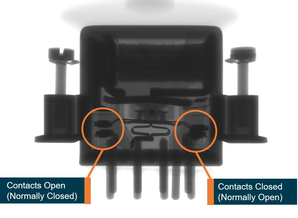 Figure 8: X-ray of defective relay showing anomalous configuration of the contacts (circled). Source: ATSB
