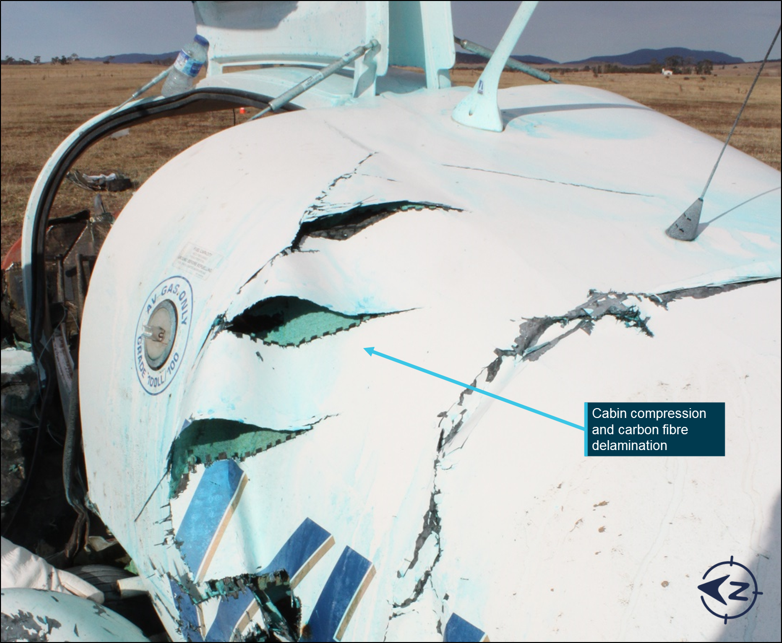 Figure 4: VH-XLK rear fuselage section showing compression damage to composite structure and creasing at empennage junction.<br />
Source: ATSB