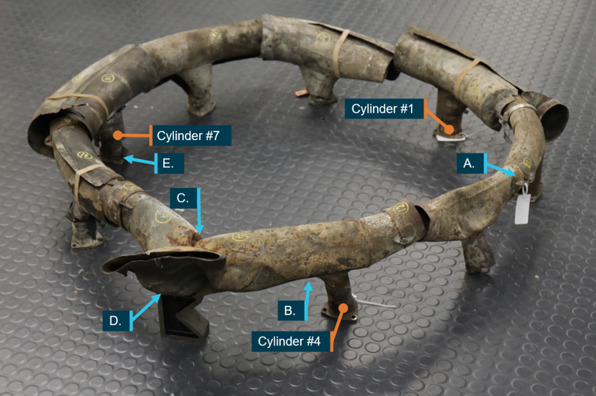 Figure 47: Exhaust segments from VH-NOO, including carburettor heat muff