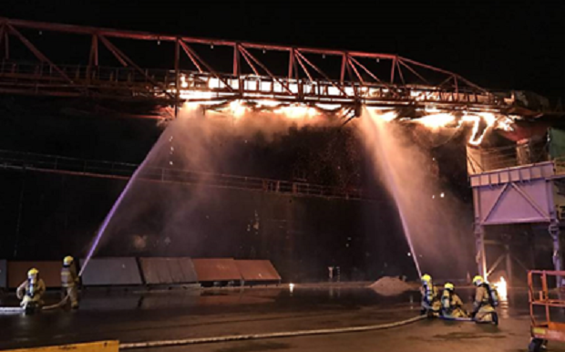 Boom conveyor on fire