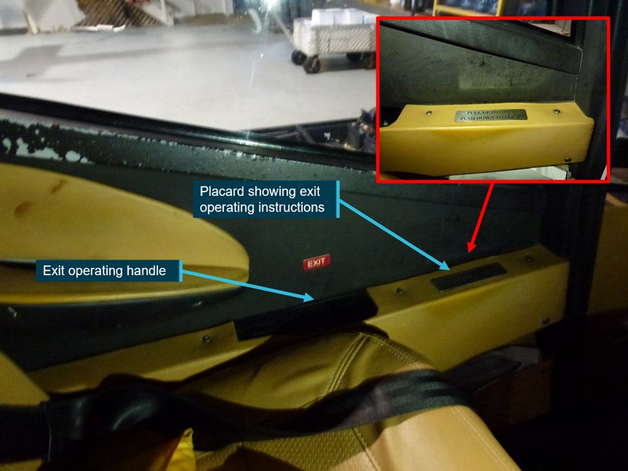 Figure 26: Emergency exit markings on rear left sliding door in VH-HIL