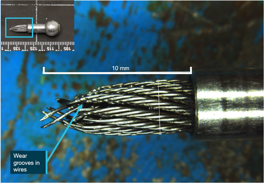 Figure 4: Close-up of the remnant cable portion near the swaged ball end fitting showed narrowing or ‘necking’ and grooves in many of the wires from severe wear damage