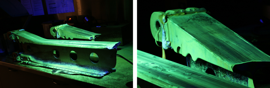 Figure 23: Composite image of the carry-through spar during liquid fluorescent penetrant inspection