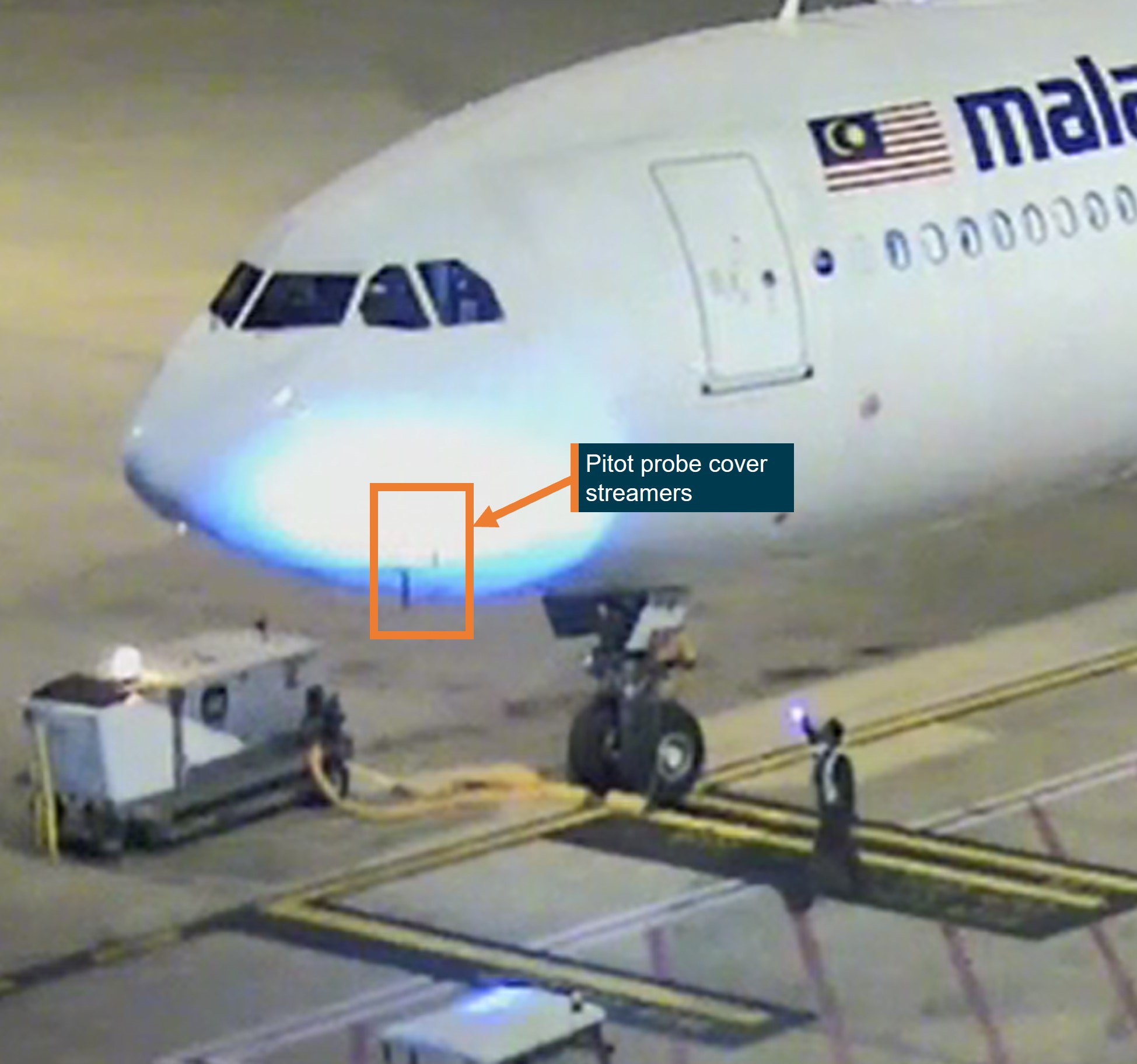 Figure 2: LAE shining torch on left pitot probes with covers fitted