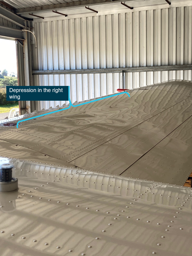 Figure 1: Fuel tank depression on the right wing