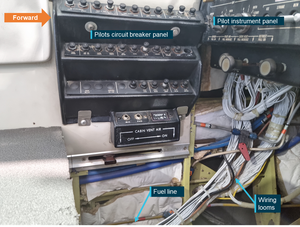 Area of concern in an exemplar aircraft showing the location of the fuel line and wiring looms. Inspection should encompass any areas along the fuel line where it may contact wiring looms.