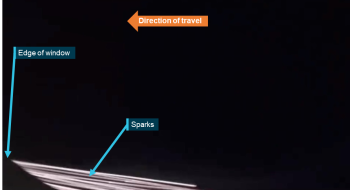 Still image from passenger video capturing sparks emanating from right engine during climb