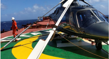 A photo of the helicopter wreckage on the deck of the bulk carrier, Star Coral