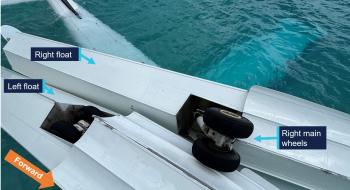 Image of overturned aircraft, post-accident, showing left main gear retracted into the float and right main gear extended.