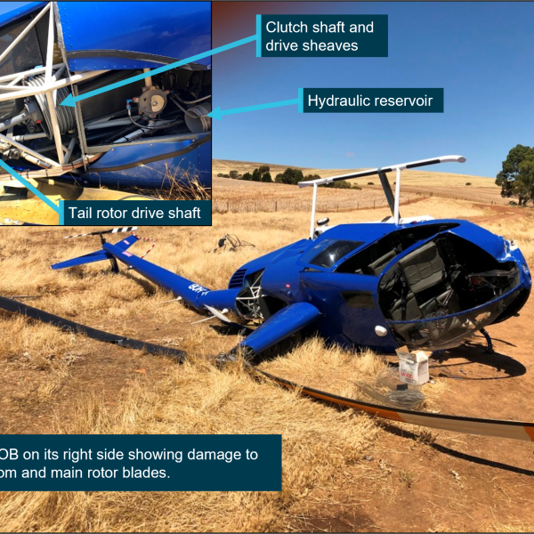 VH-HOB following the collision with inset showing clutch shaft with upper drive sheaves and displaced hydraulic reservoir