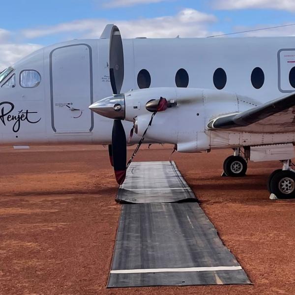 Figure 1: Damaged aircraft and dislodged matting
