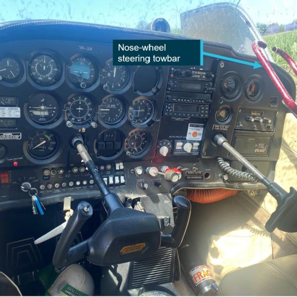 Figure 5: Nose-wheel steering towbar unrestrained in the cockpit.