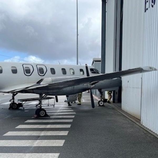 VH-WAJ shown stationary after collision with operator’s hangar.