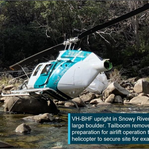 VH-BHF following the collision with terrain against a large boulder in the Snowy River, NSW