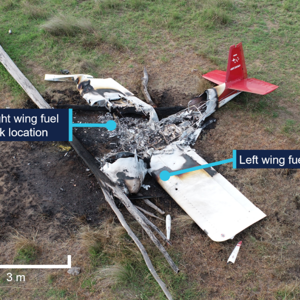 VH-YGY at the accident site showing extensive fire damage.