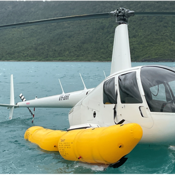 VH-8HR floating on the ocean with emergency pop-out floats inflated.