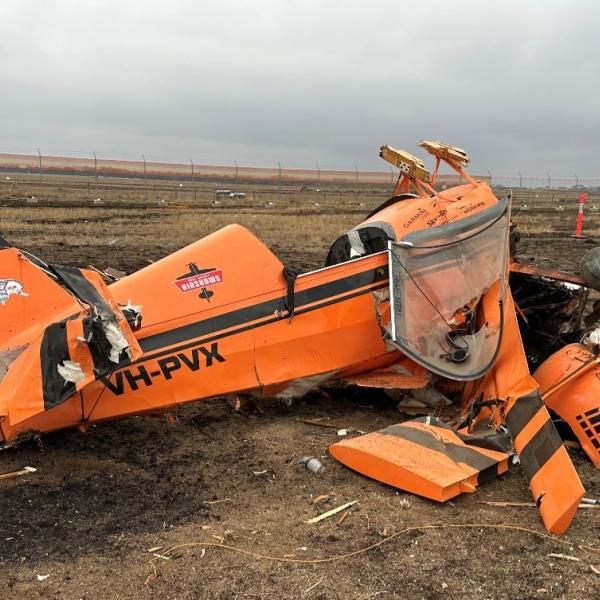 VH-PVX at the accident site, the image shows the extent of the damage resulting from the collision with terrain.