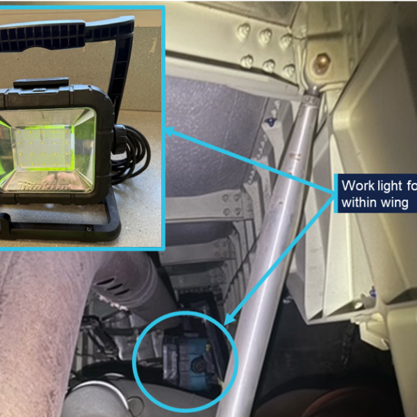 Photograph showing a work light installed within an aircraft wing near an Air Generation Unit heat exchanger, with labels and an orange arrow indicating outboard direction. An inset photo displays the portable LED work light used for illumination, featuring a black frame and yellow LED panel.