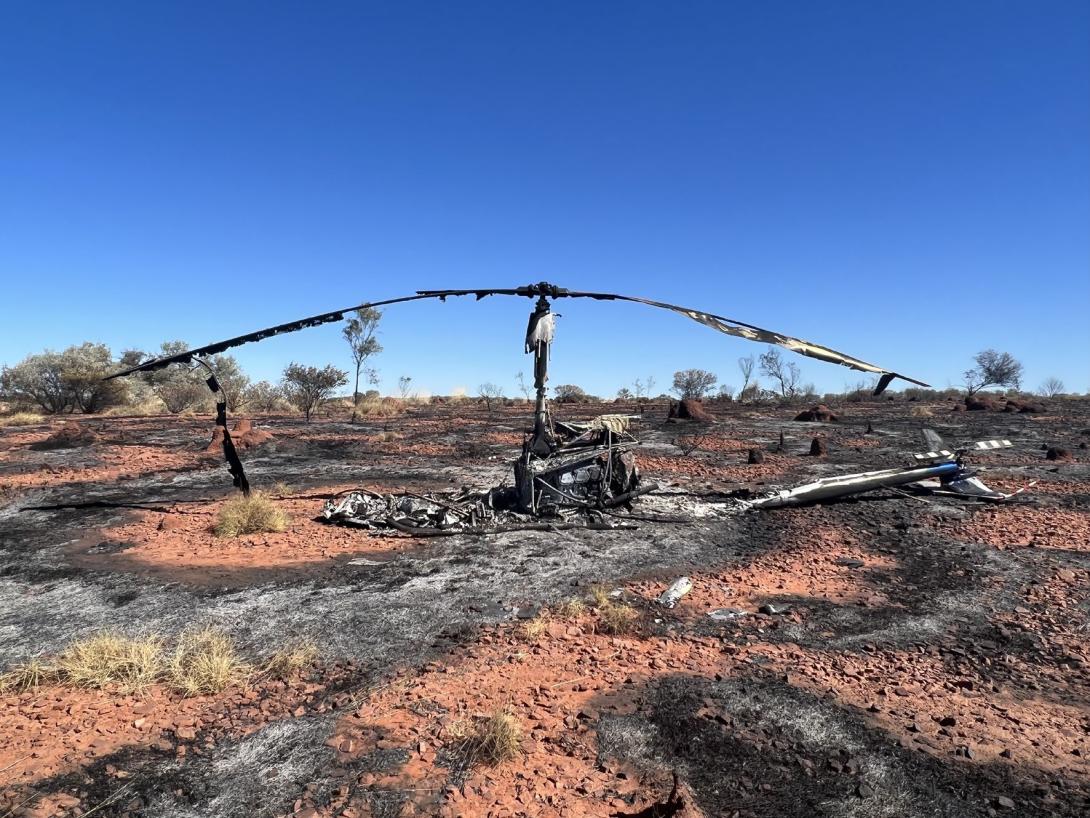Figure 1: Fire damage to the helicopter and surrounding bushland