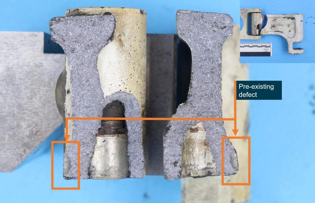 Figure 6: A semi-circular pre-existing defect (labelled) was identified on both halves of the steering link fracture surface
