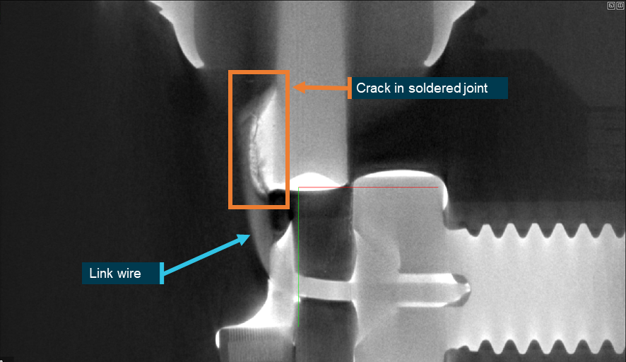 Figure 46: An X-ray of the antenna base identified a crack indication where the link wire was soldered to the circuit board (prior to destructive examination)