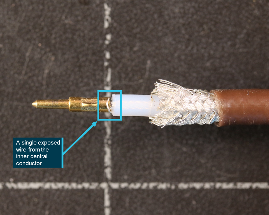 Figure 49: Stray wire from the core of the coaxial cable within the BNC connector was found outside the centre pin