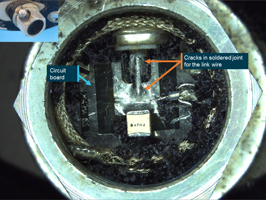 Figure A7: Antenna base: removal of the potting compound from within the antenna base confirmed the soldered joint containing the link wire had cracked and fractured from the circuit board