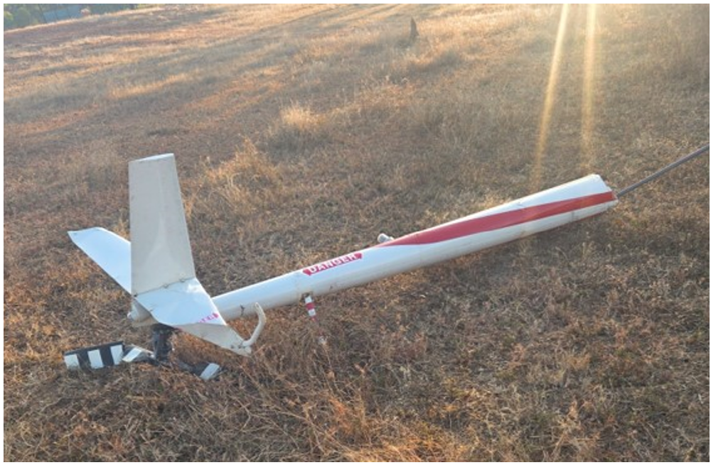Robinson R22 Tail boom separated from the main fuselage of the helicopter. The images shows significant damage to the tail rotor and vertical stabiliser.