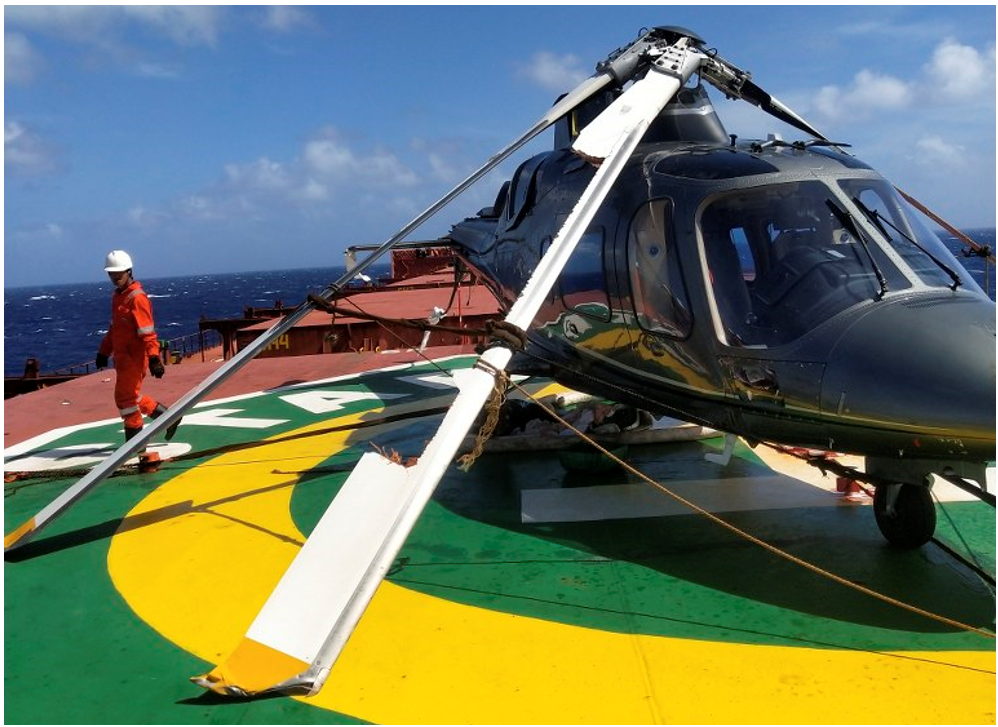 A photo of the helicopter wreckage on the deck of the bulk carrier, Star Coral