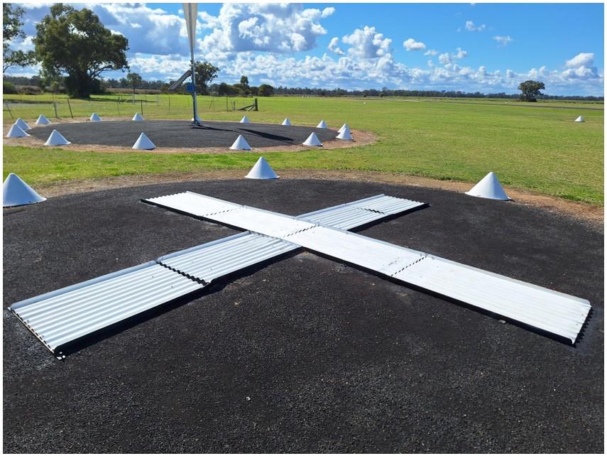 Figure 1: Extended white cross indicating aerodrome closure