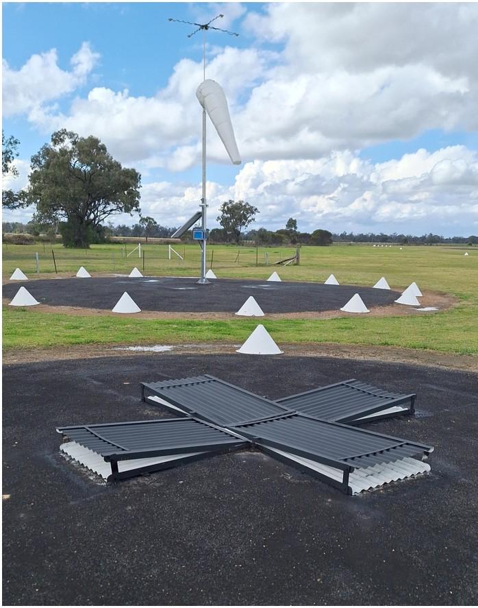 Figure 2: Folded cross sign (black) indicating aerodrome open